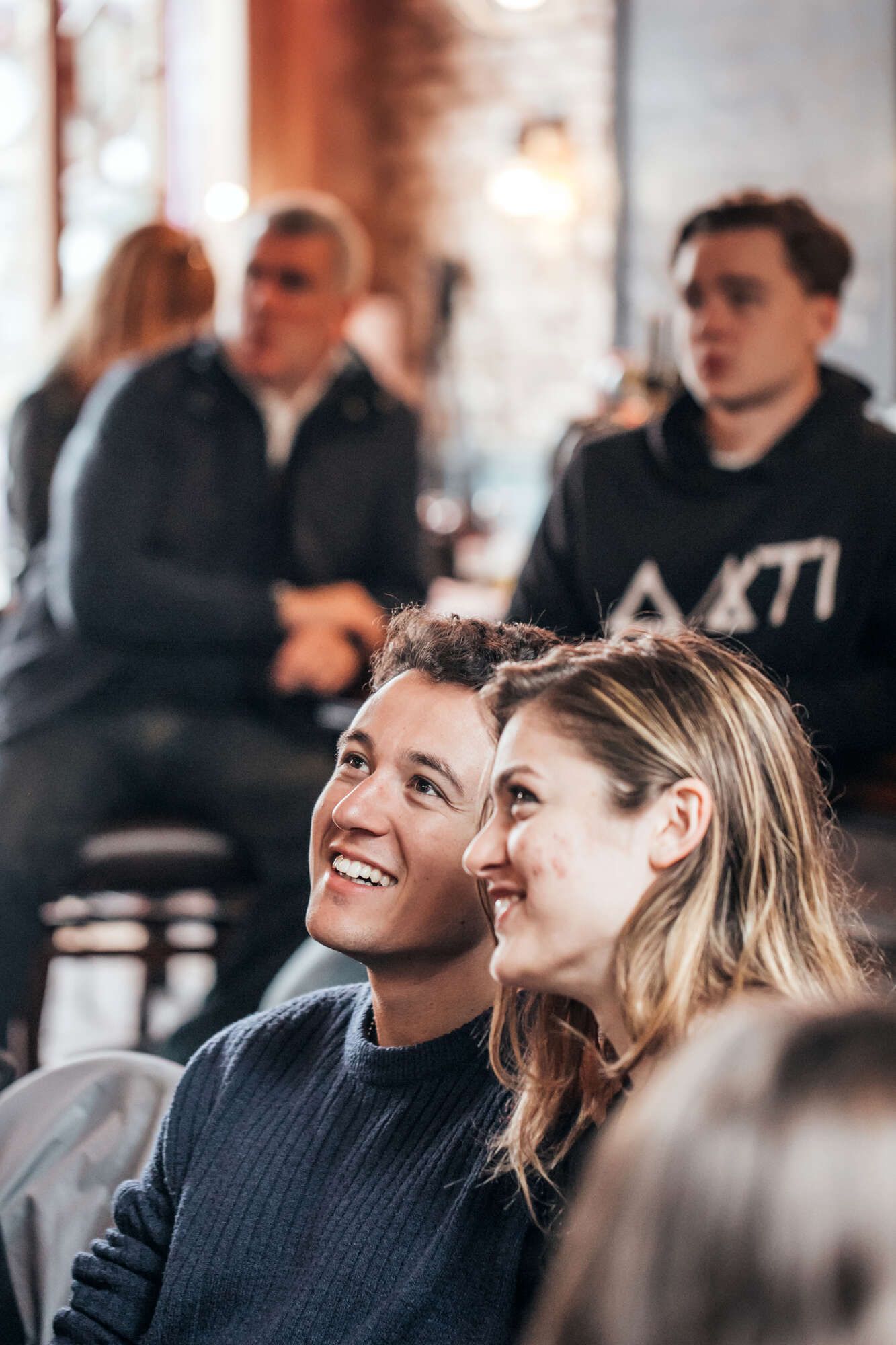 Couple watching football game