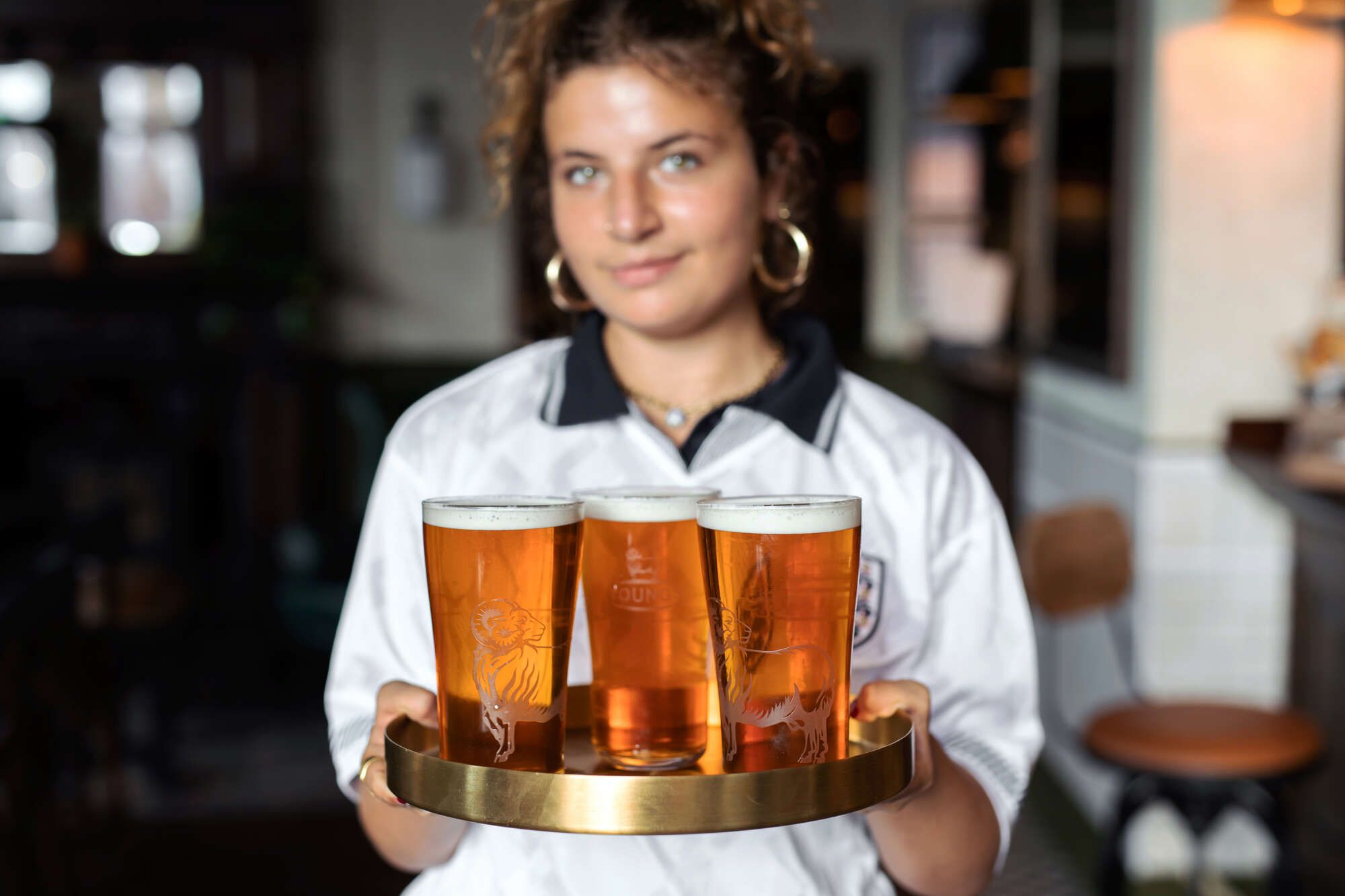 Woman holding a few pints